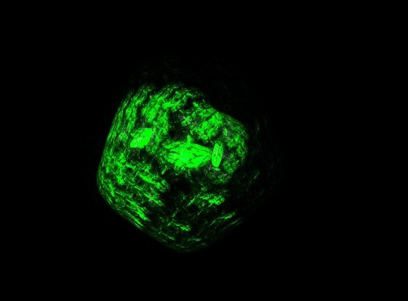 glowing green rock