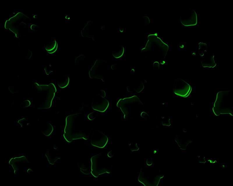 glowing green shapes on black