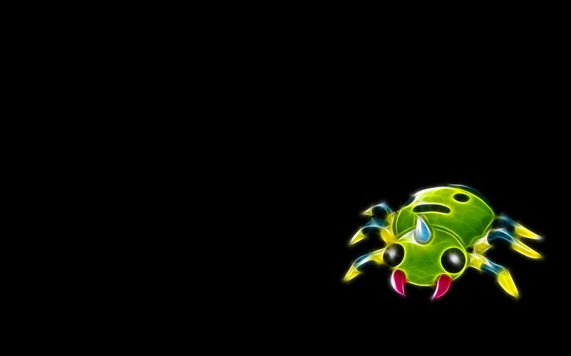 glowing green spider creature