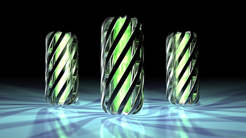 glowing green spiral sculptures