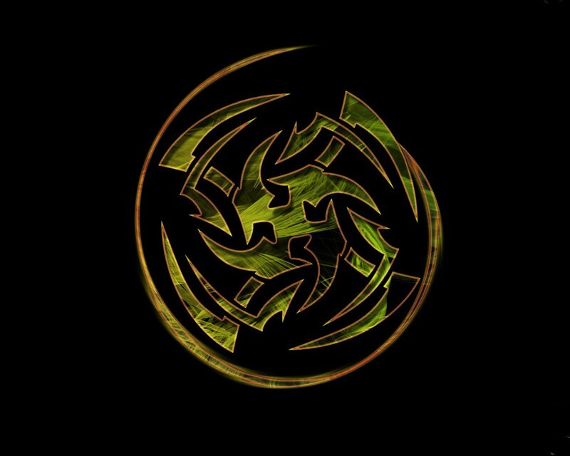 glowing green tribal symbol