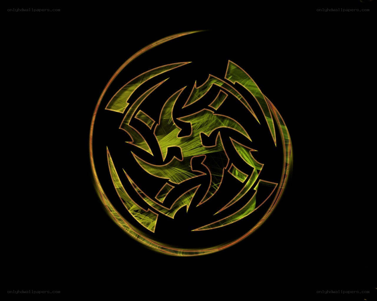 glowing green tribal symbol