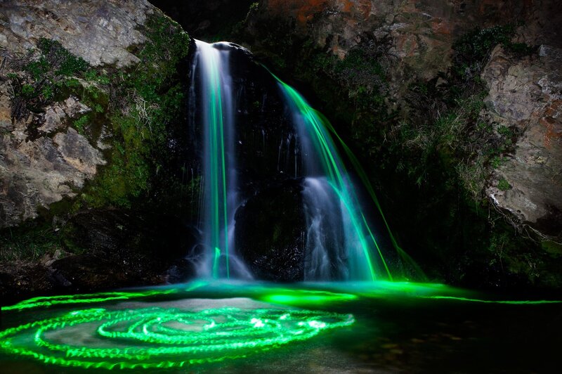 Glowing Green Waterfall — Dramatic