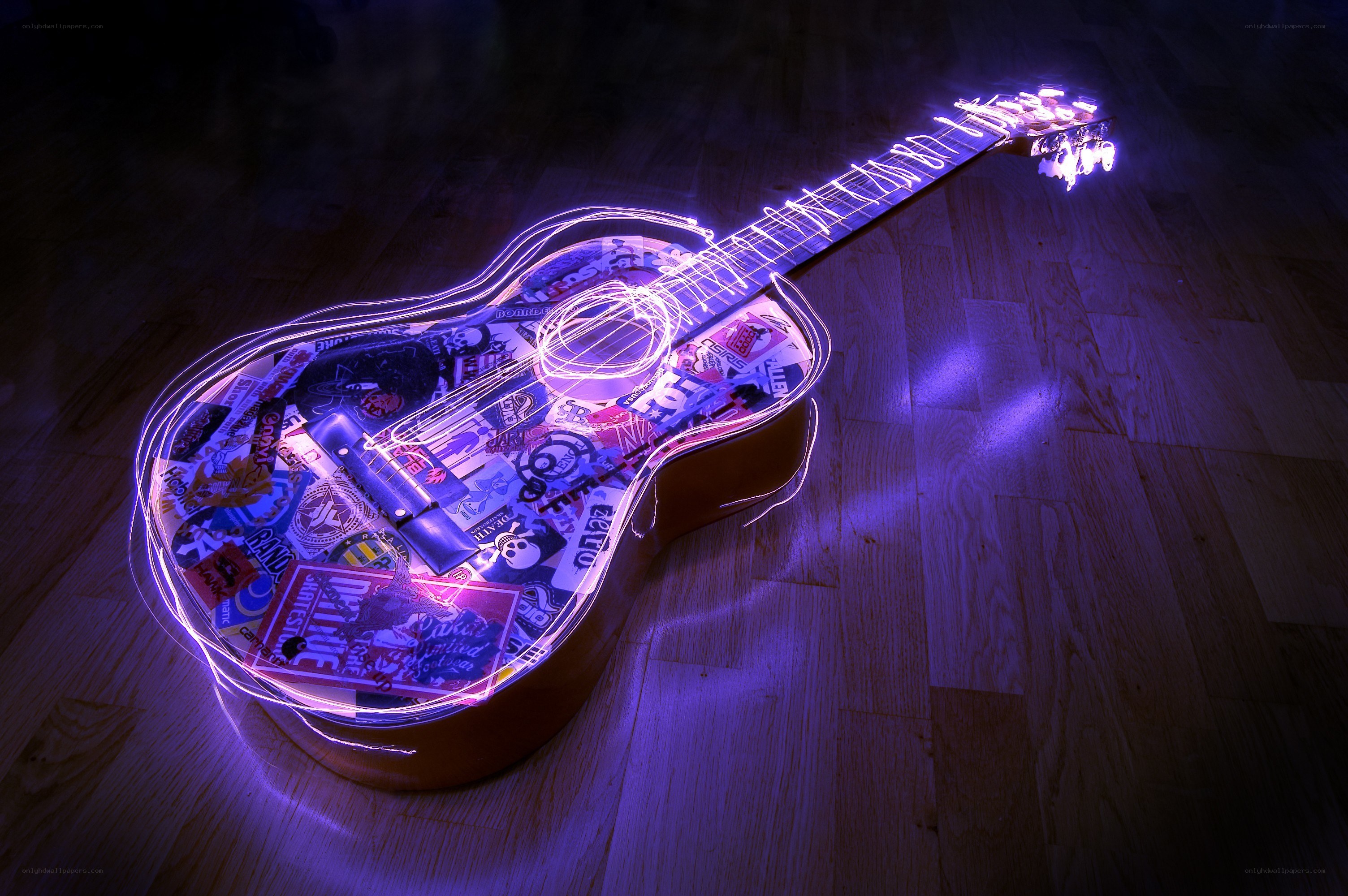 glowing guitar with stickers