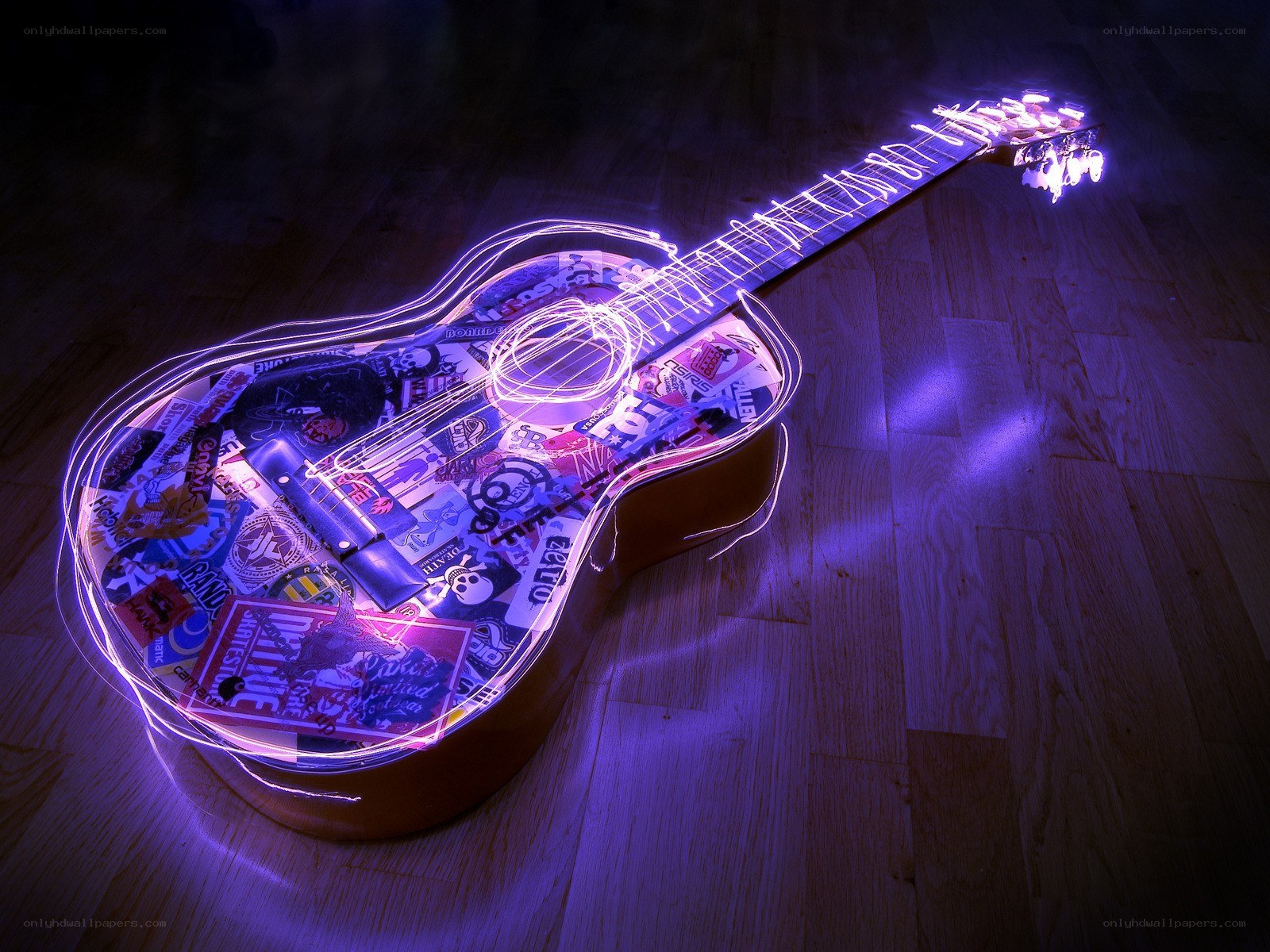glowing guitar with stickers