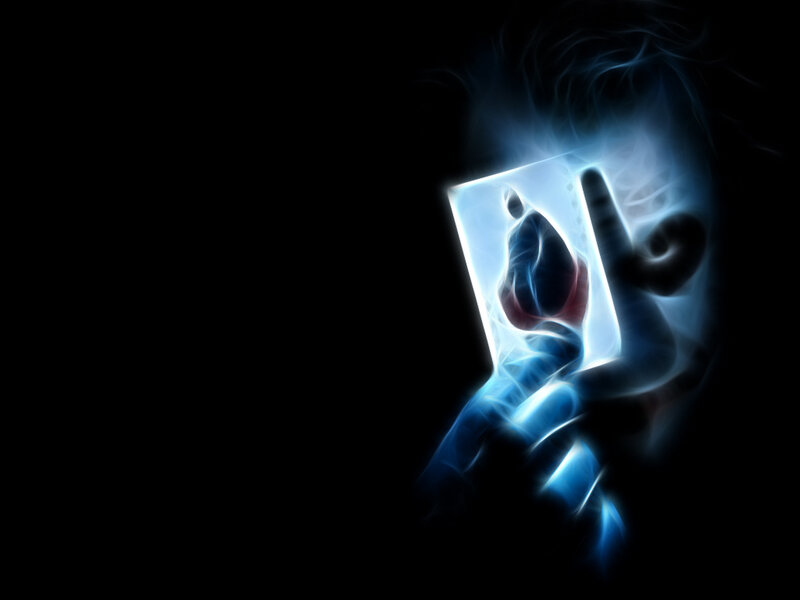 glowing hand holding card