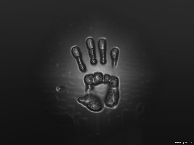 glowing handprint on dark background