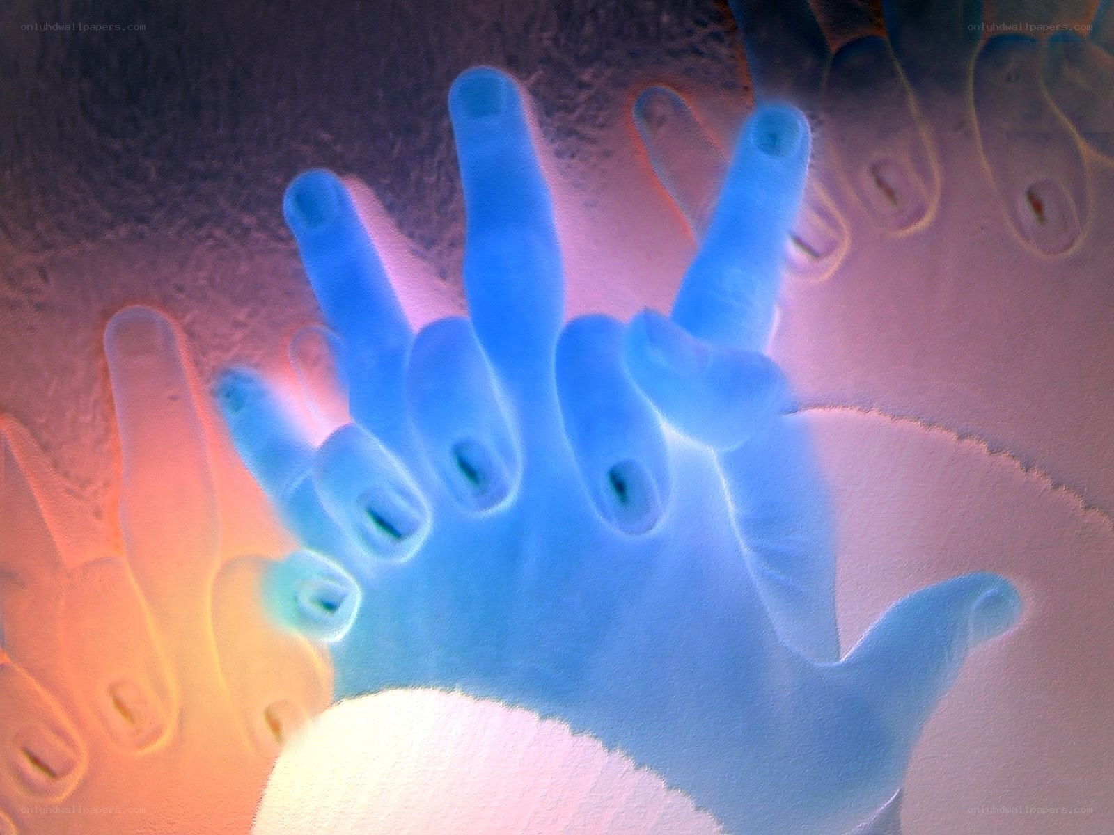 glowing hands on glass