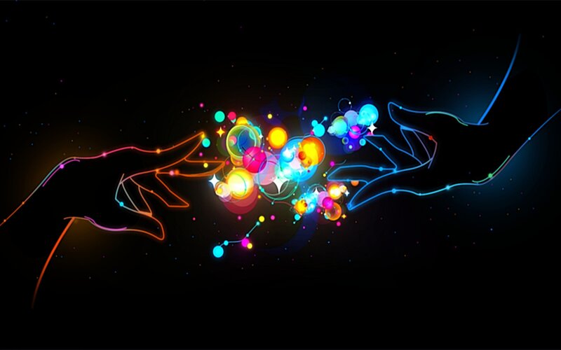 Glowing Hands Touching