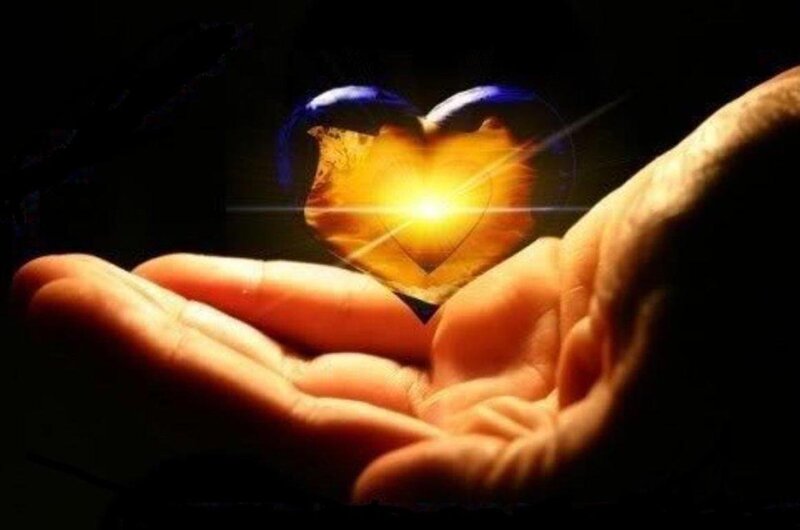 Glowing Heart in Hands