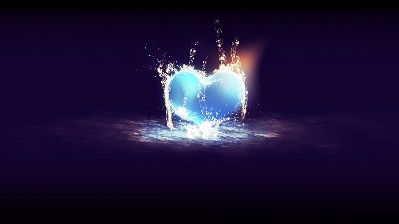 glowing heart in water splash