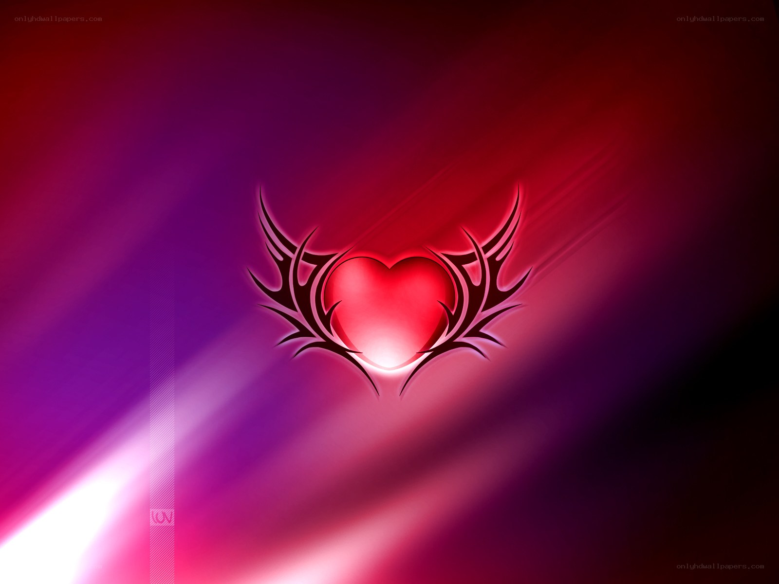 glowing heart with tribal wings