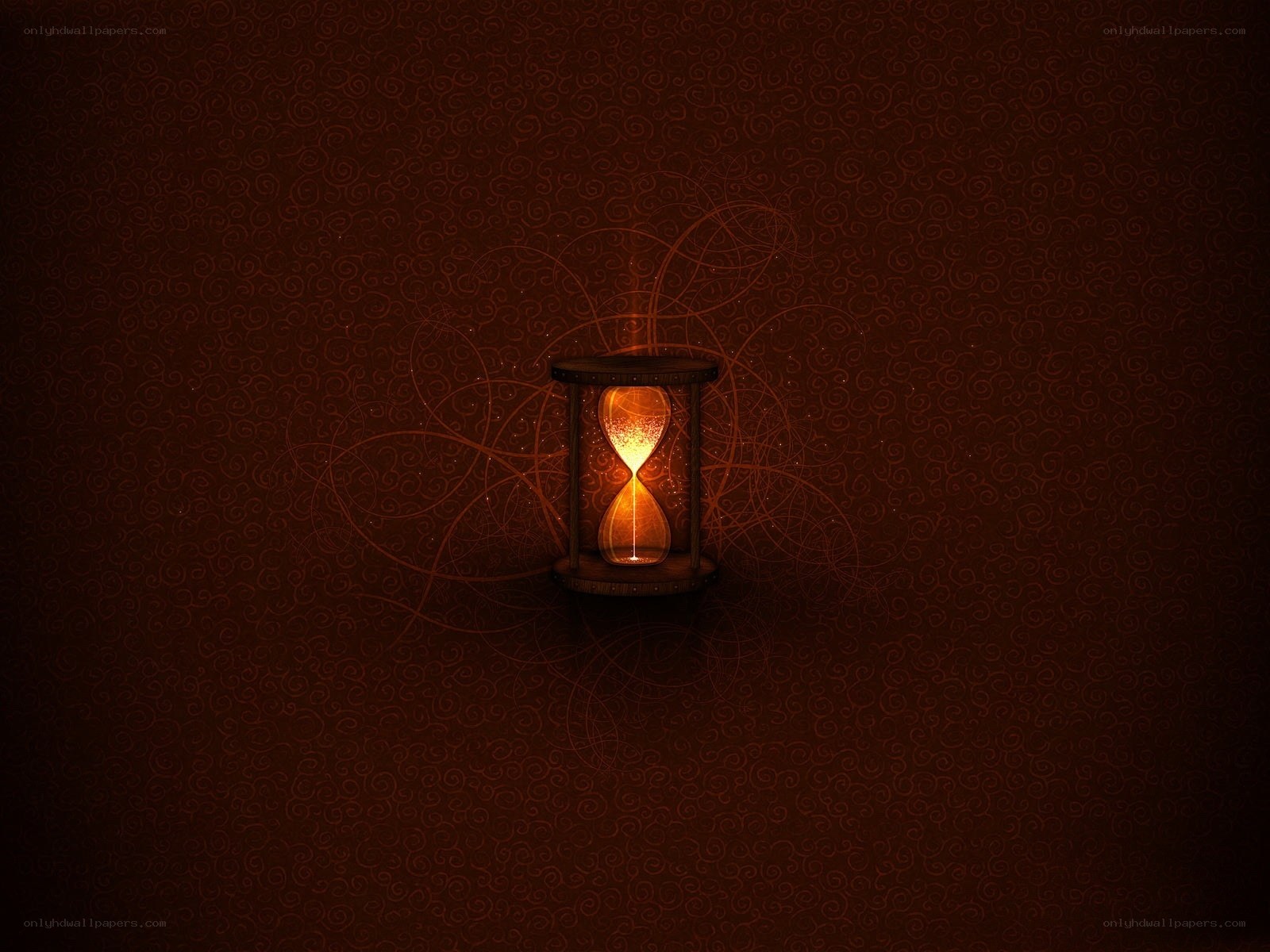 glowing hourglass on dark background