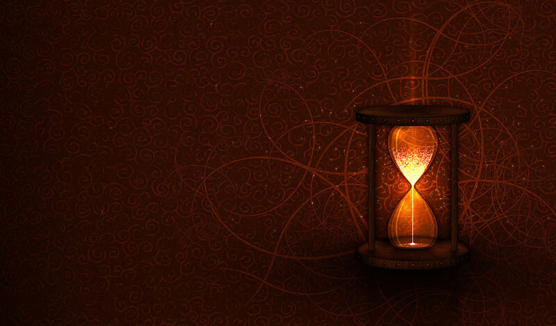 glowing hourglass on patterned wall