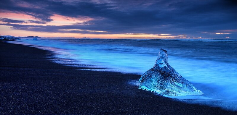 Glowing Ice Chunk on Beach