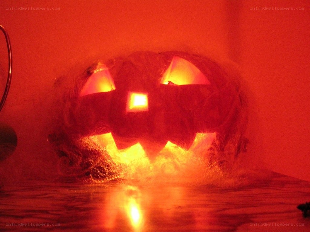 glowing jack-o-lantern in fog