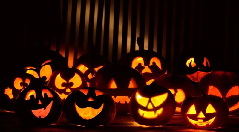 glowing jack-o-lanterns at night