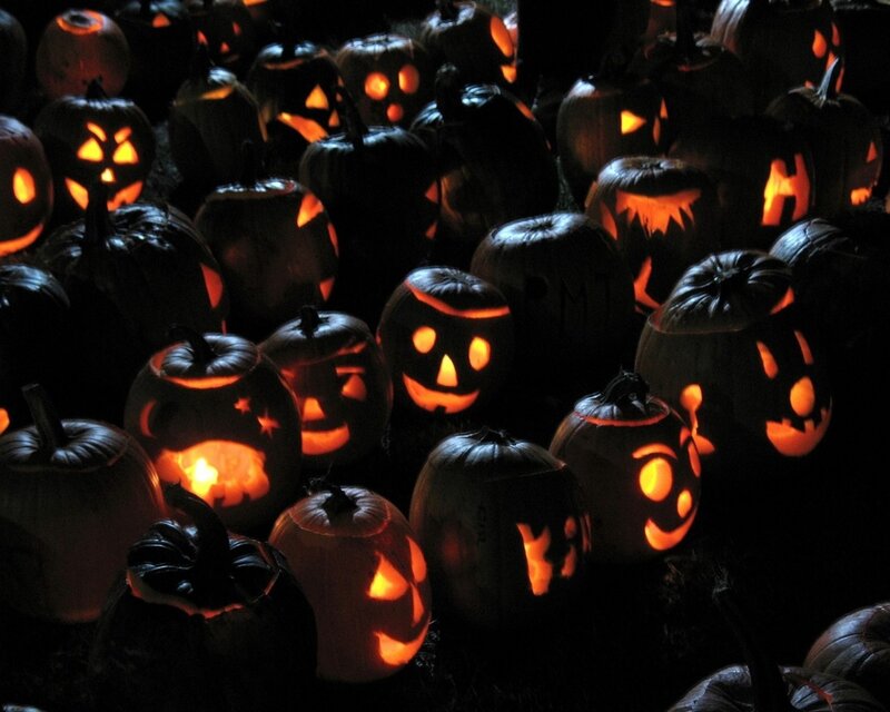 glowing jack-o-lanterns at night