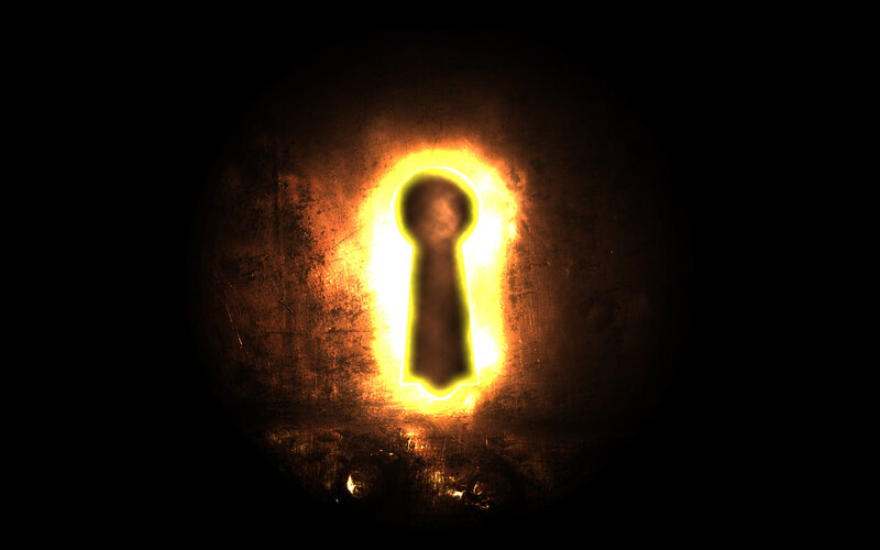 glowing keyhole in dark