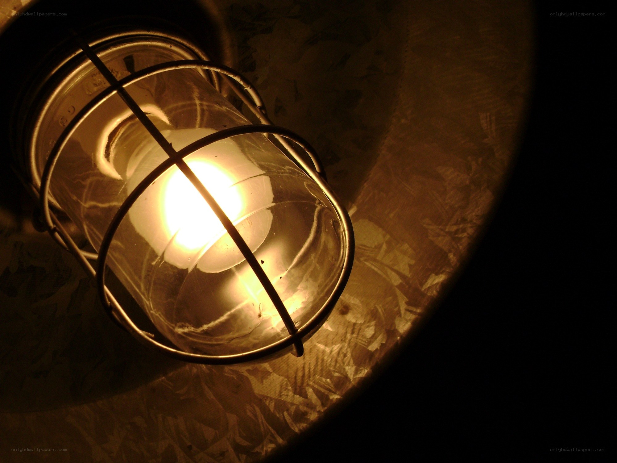 glowing lamp in a cage