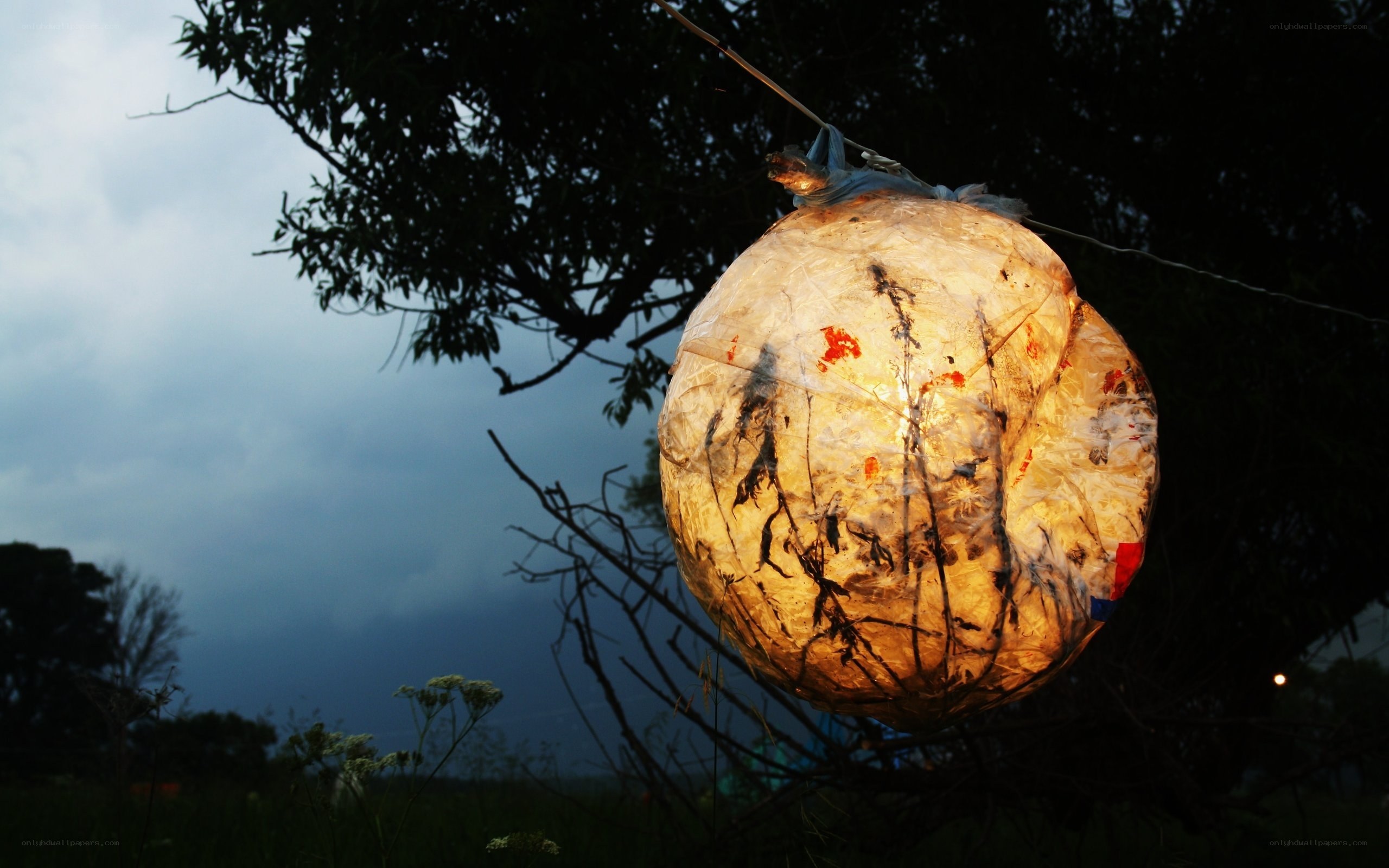 glowing lantern at dusk