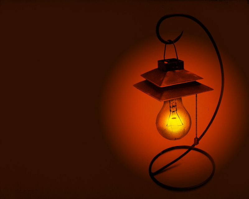glowing lantern on stand