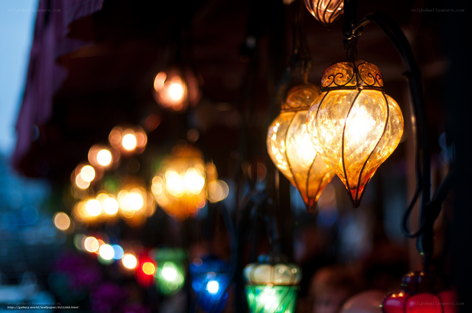 Glowing lanterns at night market