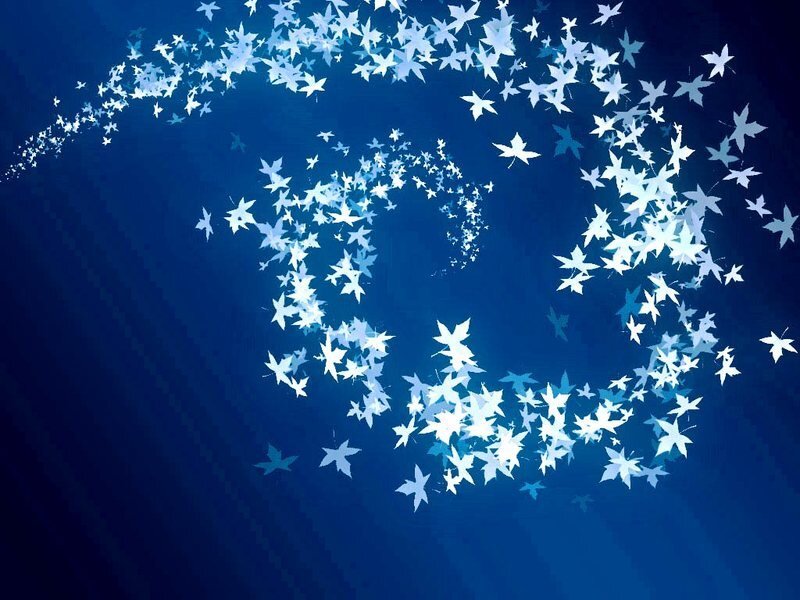 glowing leaf particles in blue