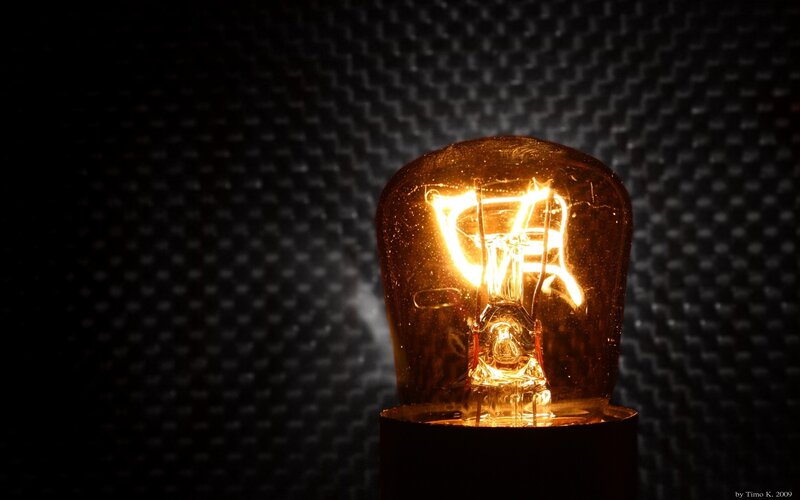 Glowing Light Bulb — Black, Dramatic, Photograph, Light Bulb, Dark Background