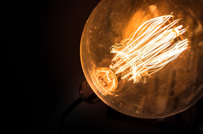 Glowing Light Bulb Filament — Orange