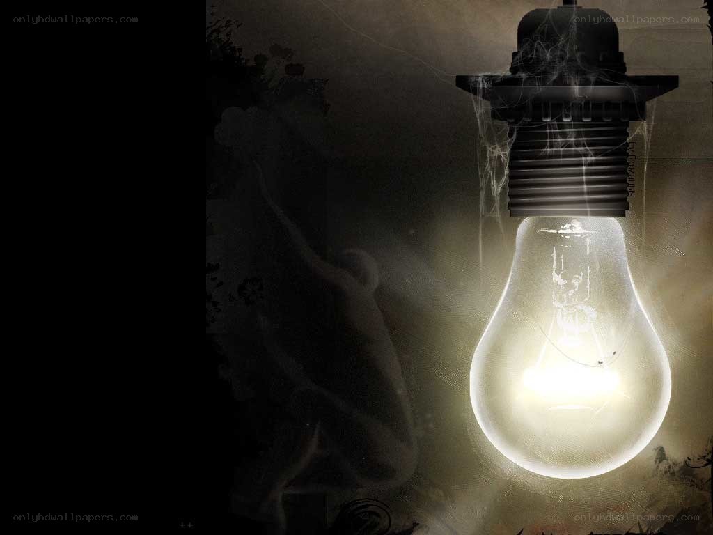 glowing light bulb in dark
