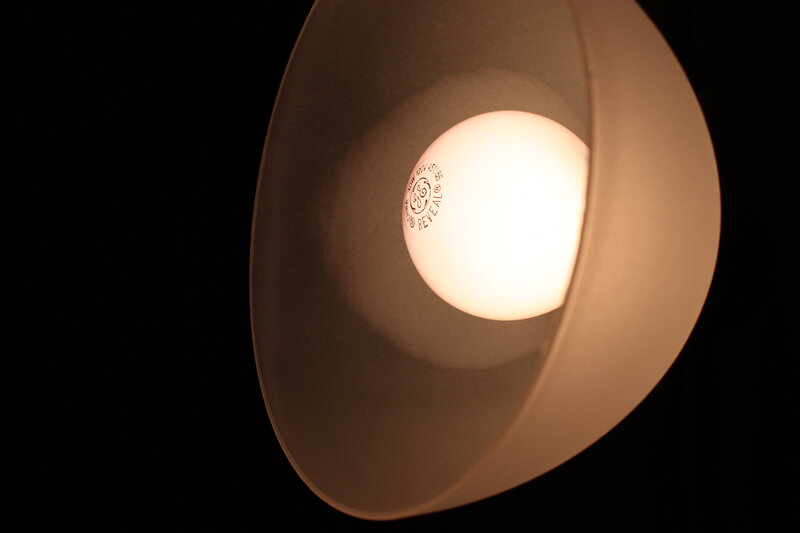 glowing light bulb in shade