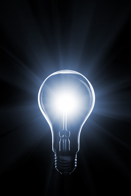 Glowing Light Bulb — White, Dramatic