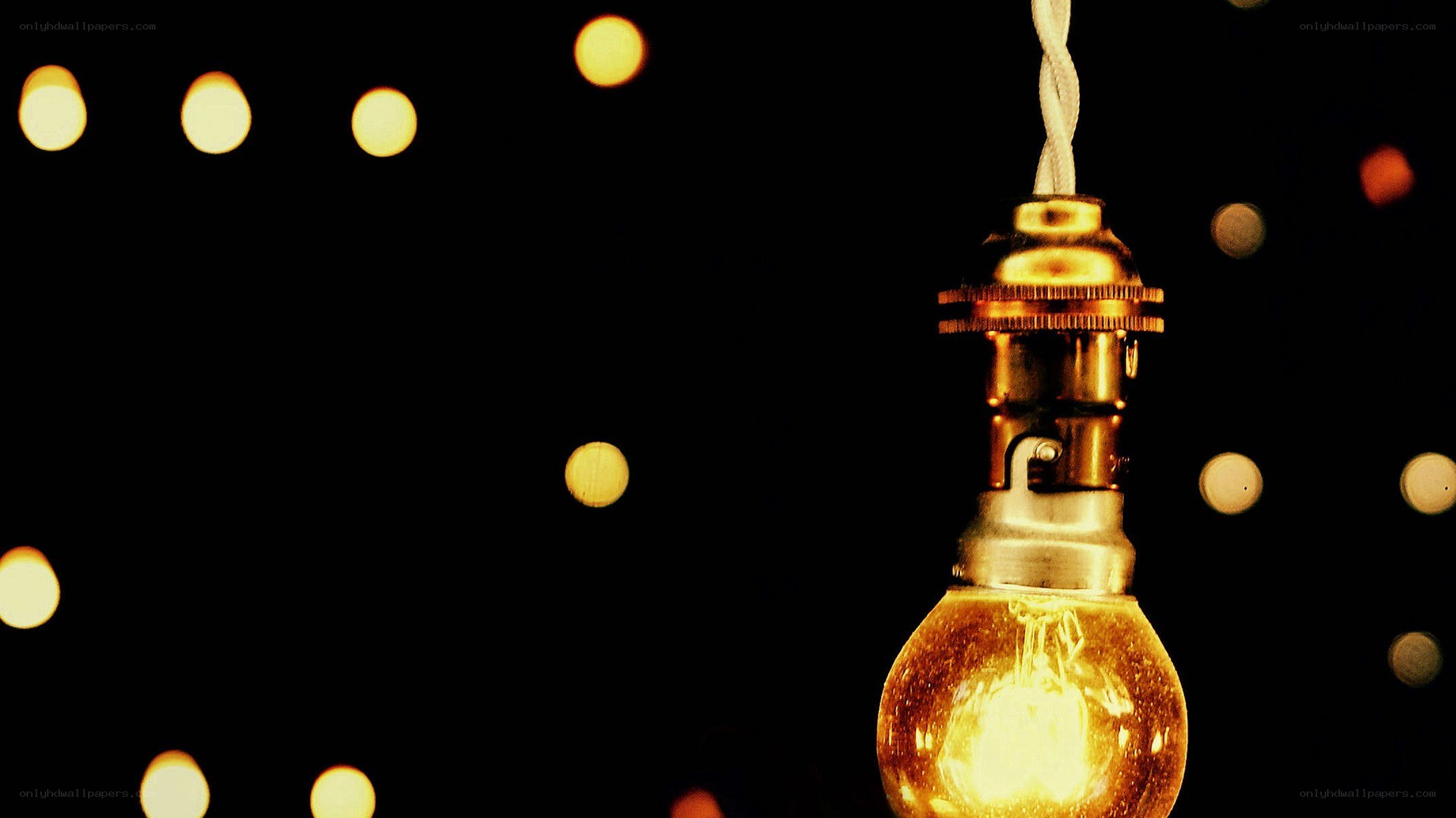 glowing light bulb with bokeh