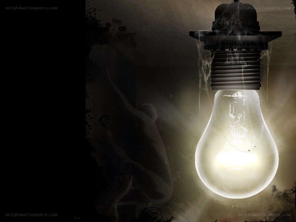 glowing light bulb with ghostly figure