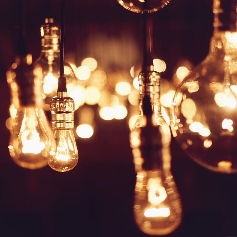 Glowing Light Bulbs — Gold