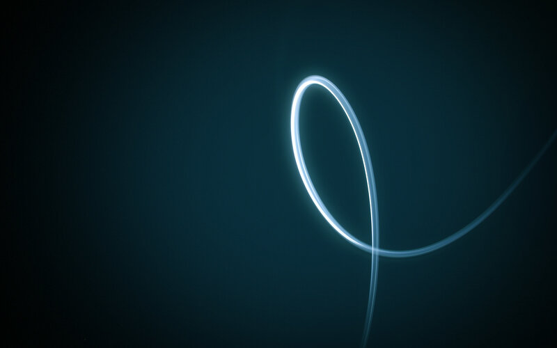 glowing light trail on dark background