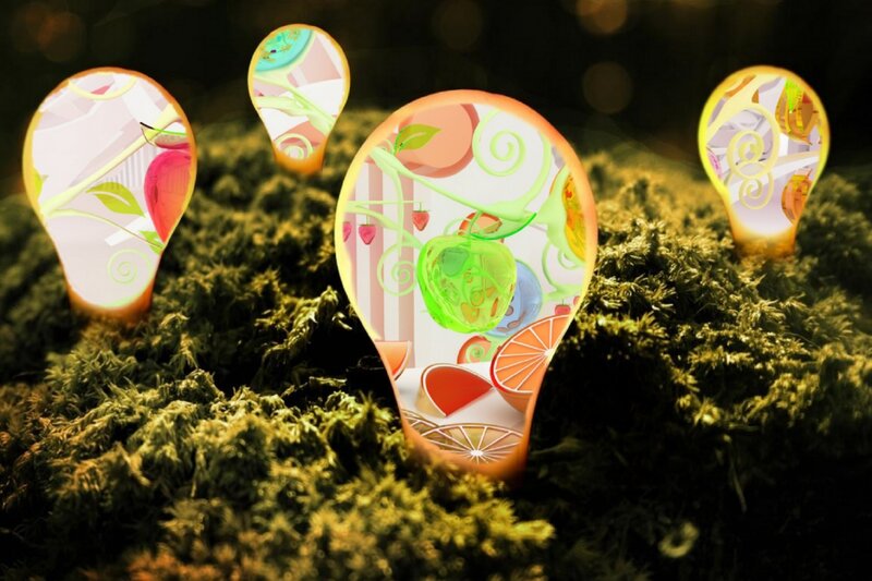 Glowing Lightbulbs in Moss