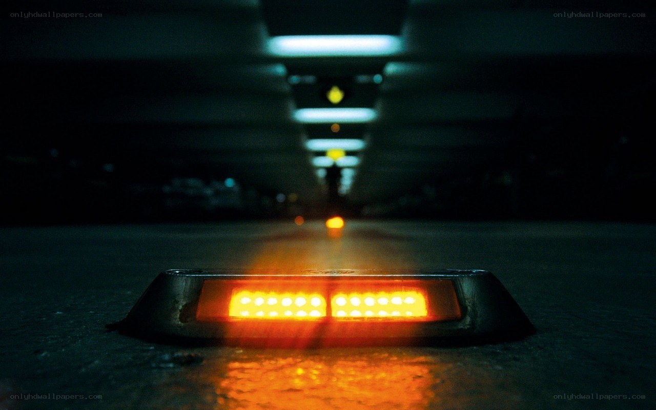 glowing lights in a parking garage