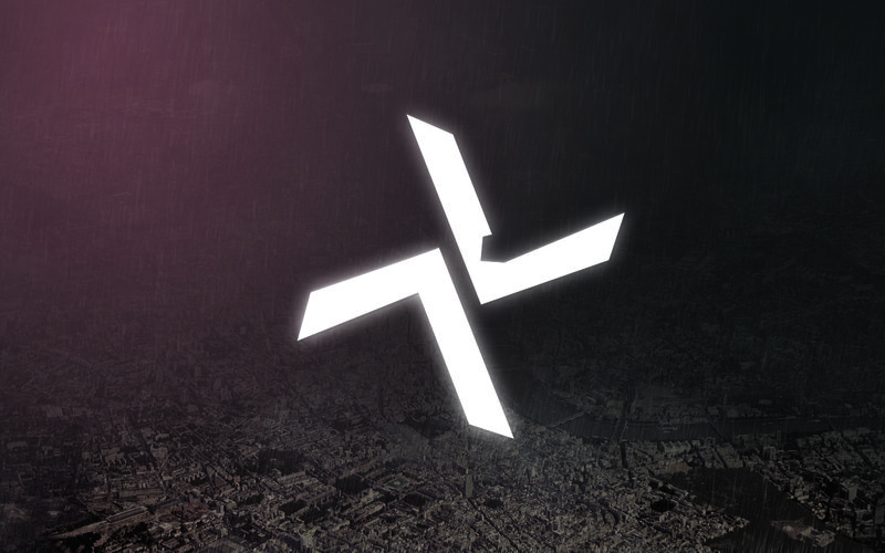 glowing logo over cityscape