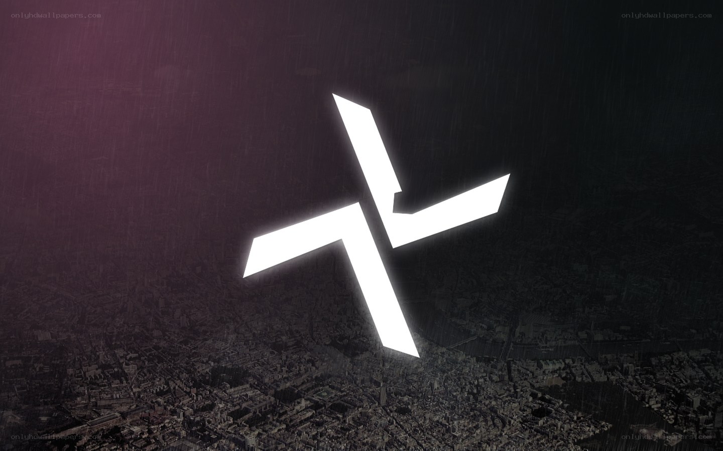glowing logo over cityscape