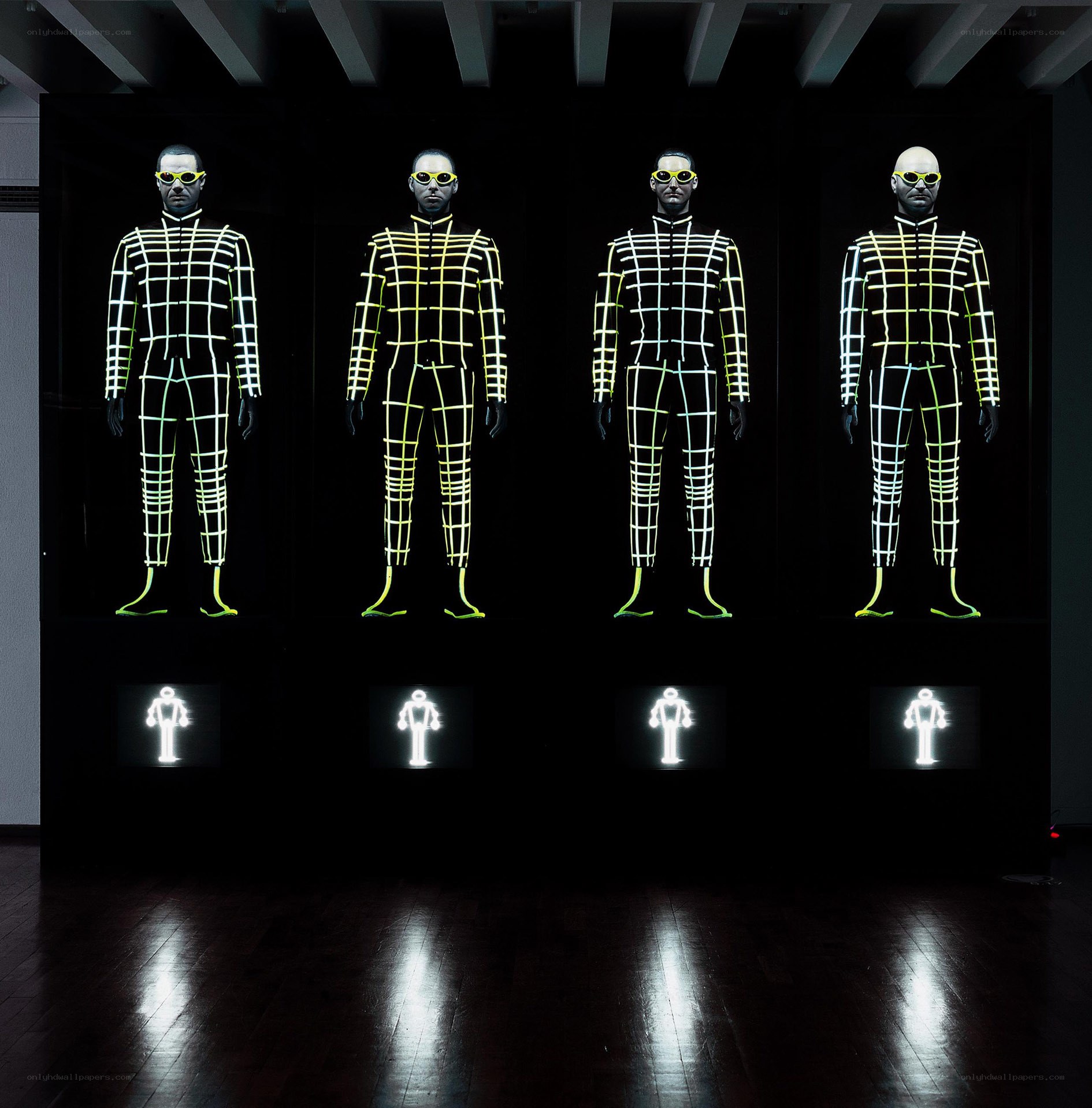 glowing mannequins in grid suits