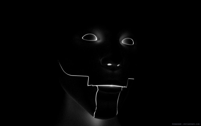 glowing mask in darkness