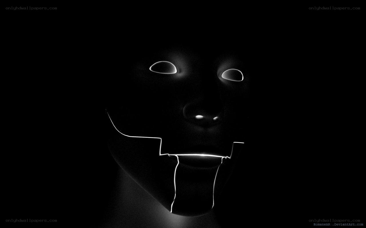 glowing mask in darkness
