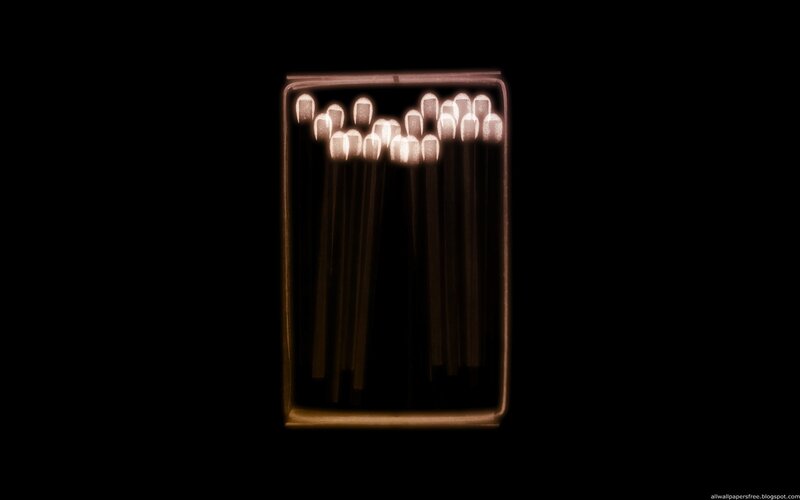 glowing matchsticks in a box