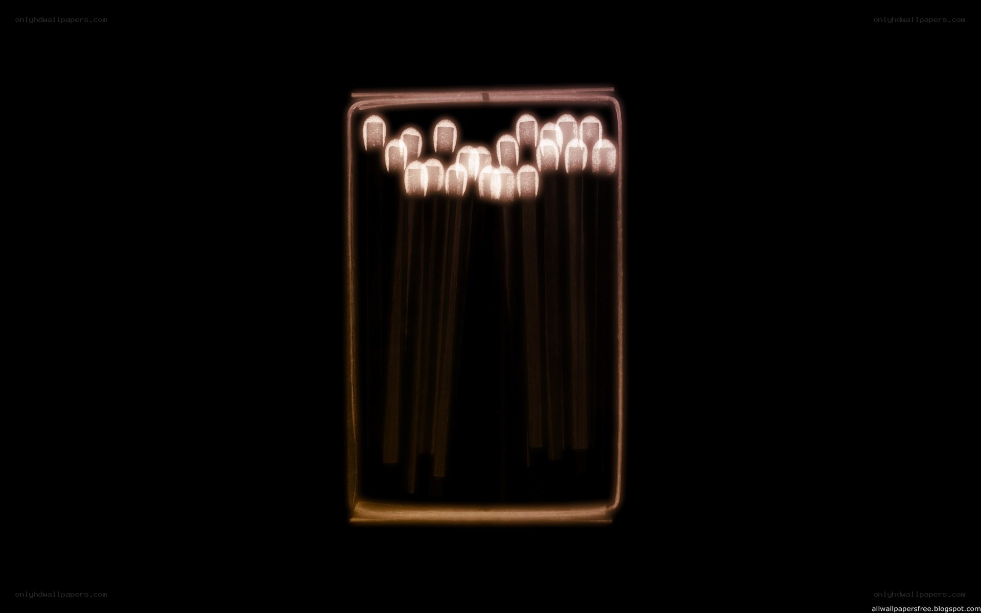 glowing matchsticks in a box
