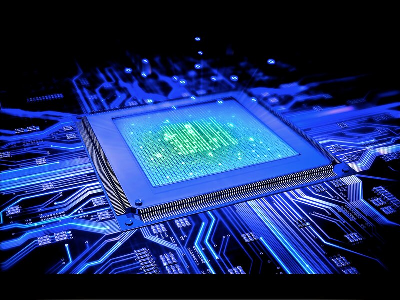 glowing microchip on circuit board