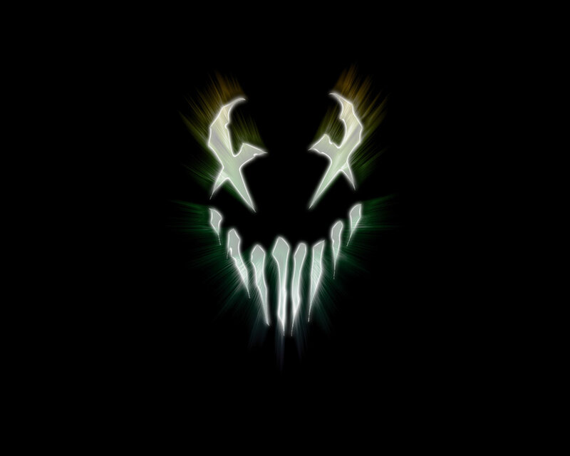 glowing monster face logo