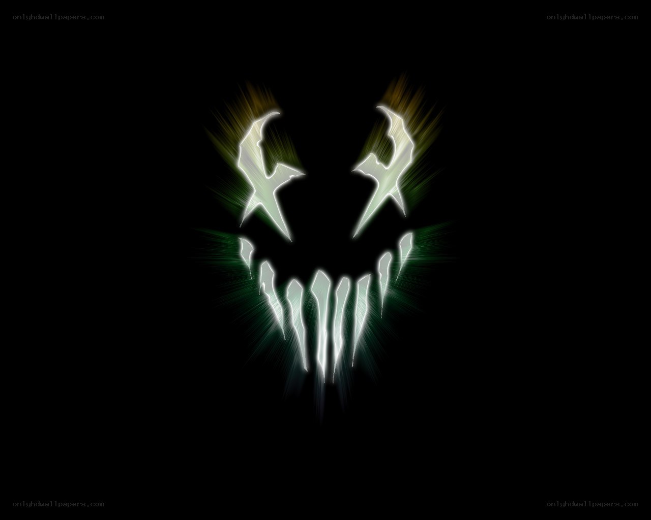 glowing monster face logo