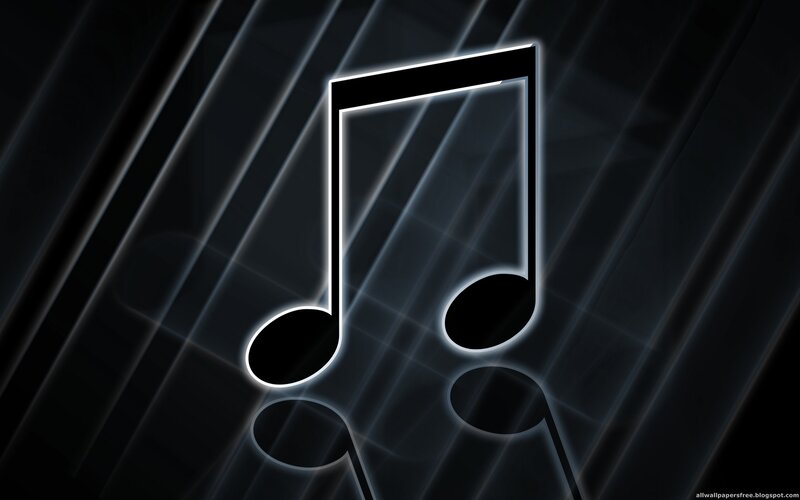 glowing music note on dark background